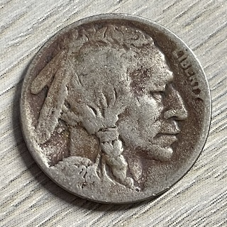 1928 Buffalo Nickel clipped planchet error showing missing curved section of coin edge